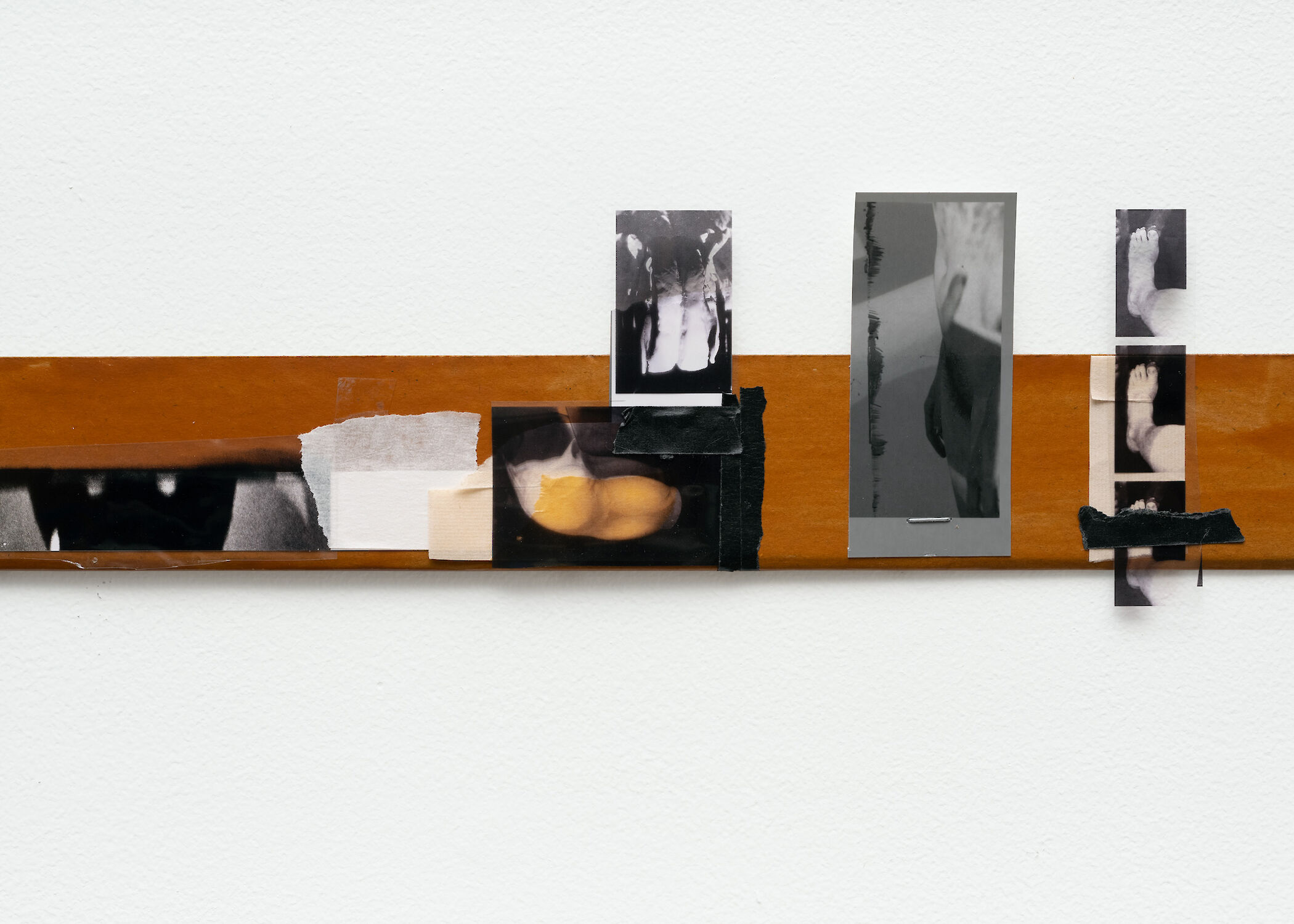B. Ingrid Olson, Psychos Reservoir (Video Strip Contents I), 2012–2025, paper, plastic sheet, laser print, inkjet print, aluminum tape, chipboard, nails, 89 × 6.4 × 6 cm. Courtesy of the artist and Croy Nielsen.