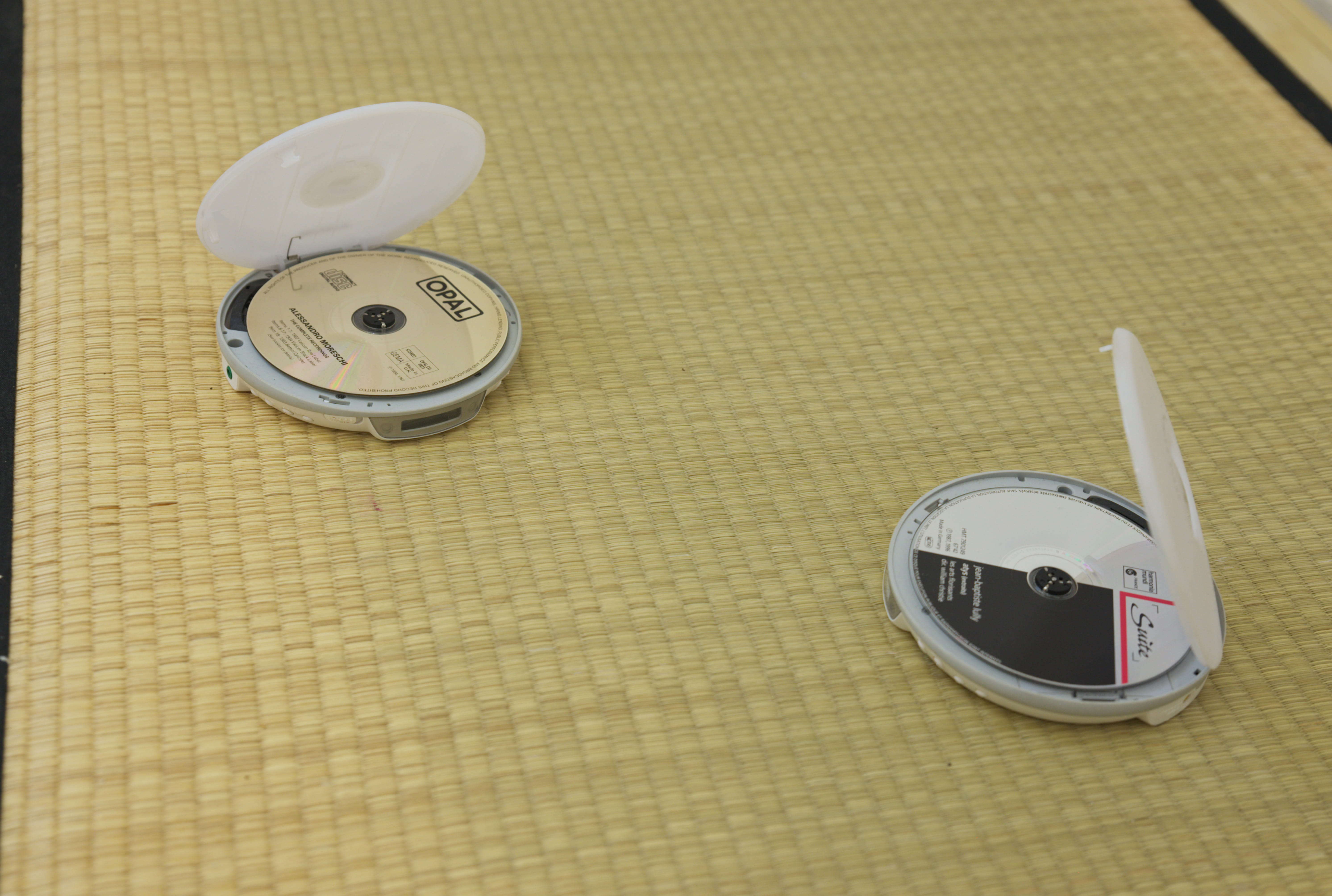 Lukas Kalos, Young almond (2025) and Young noise (2025), CDs of Lully's Atys (1987) conducted by Les Arts Florissants and Alessandro Moreschi: The Last Castrato (1902-1904), Sony CD Walkman. Courtesy of the artist and RTA.