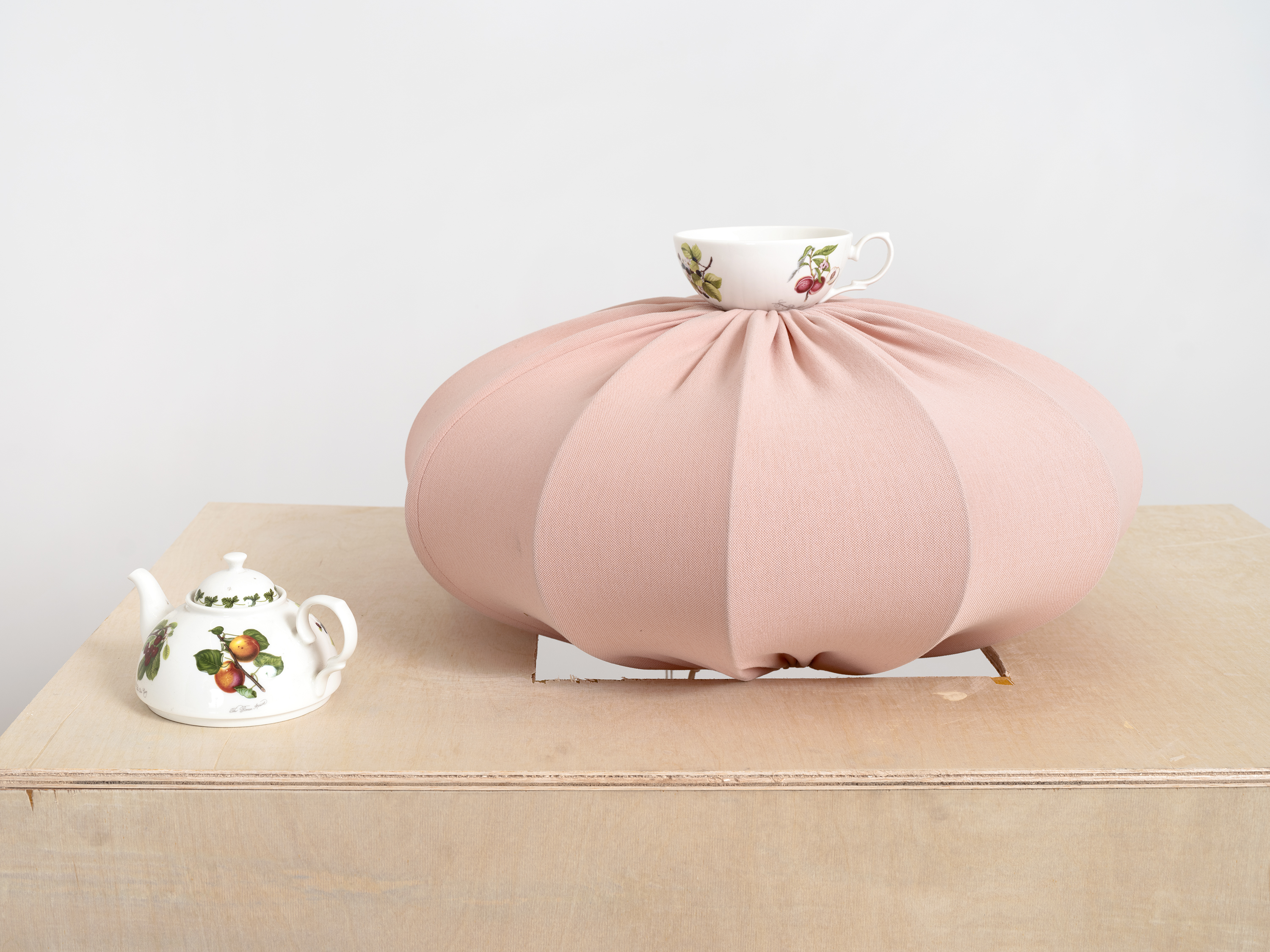 Ravi Jackson, Baby Plinth (Detail), 2026, Wood, lamp shade, teapot, teacup, plexiglass, tupperware, acrylic, tape, string, and brackets, 54 x 36 x 24 inches 137.2 x 91.4 x 60.1 cm. Courtesy of the artist and Page (NYC).