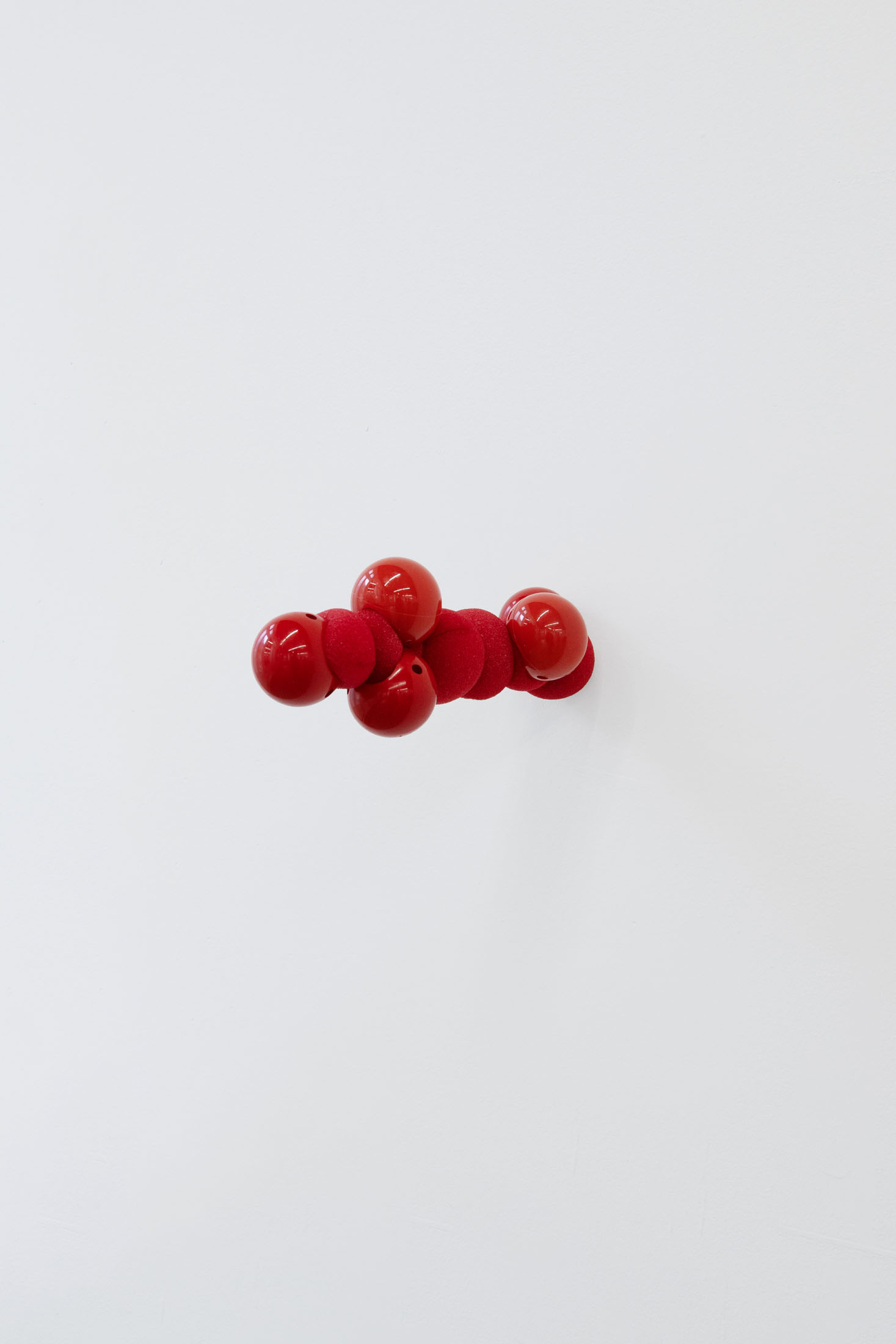 Clémentine Adou, Red Noses, 2026, steel rod, plastic clown nose, foam. Courtesy of the artist and Café des Glaces, Tonnerre.