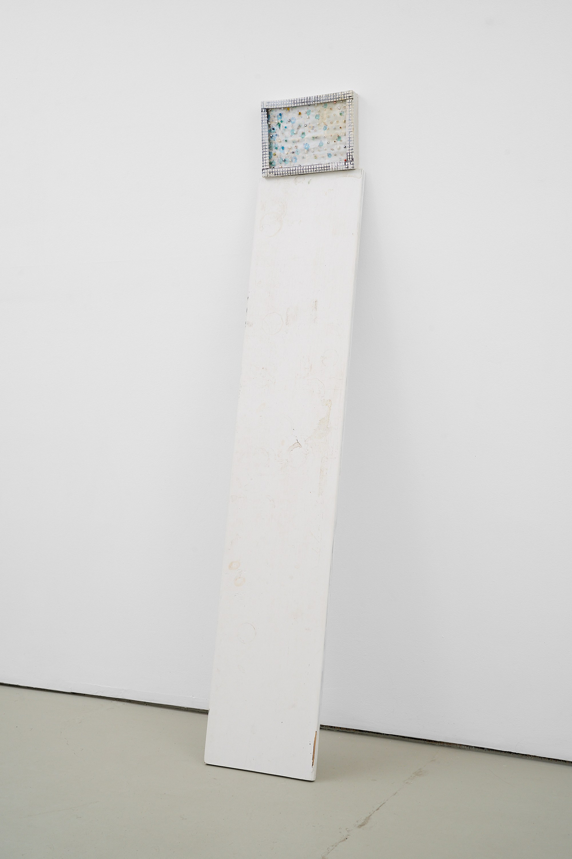 Whitney Claflin, Stanton, 2026, oil, enamel, acrylic, beads, tape, and stickers on found object on former shelf, 65h x 11w x 14d in, 165.10h x 27.94w x 35.56d cm. WC-26-42. Courtesy of the artist and The Green Gallery.