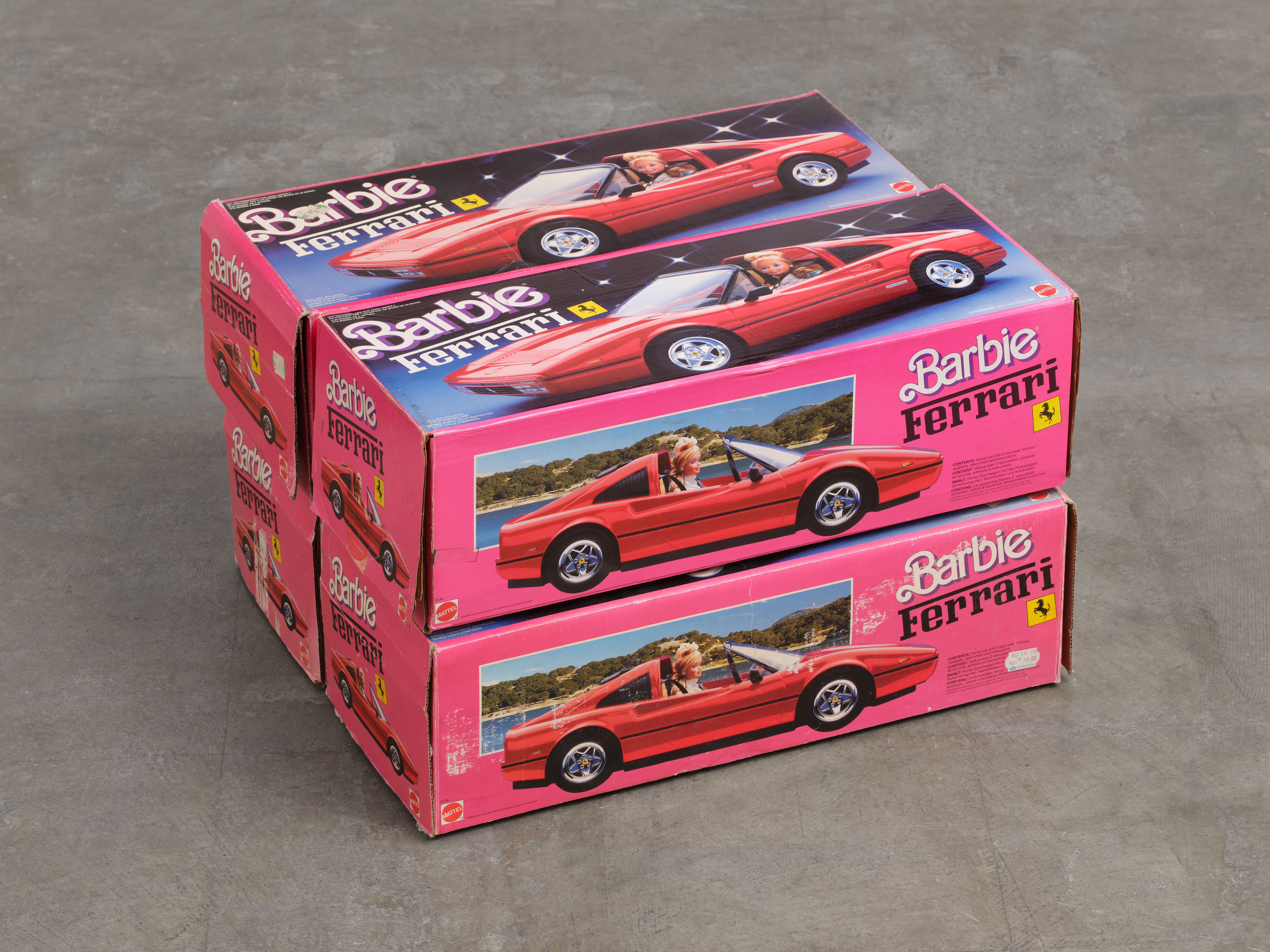 Merlin Carpenter, Untitled, 1991-2/2022/2026, Barbie Ferrari boxes, 14 x 18 x 22 in (35.6 x 45.7 x 55.9 cm). Courtesy of the artist and Bel Ami.