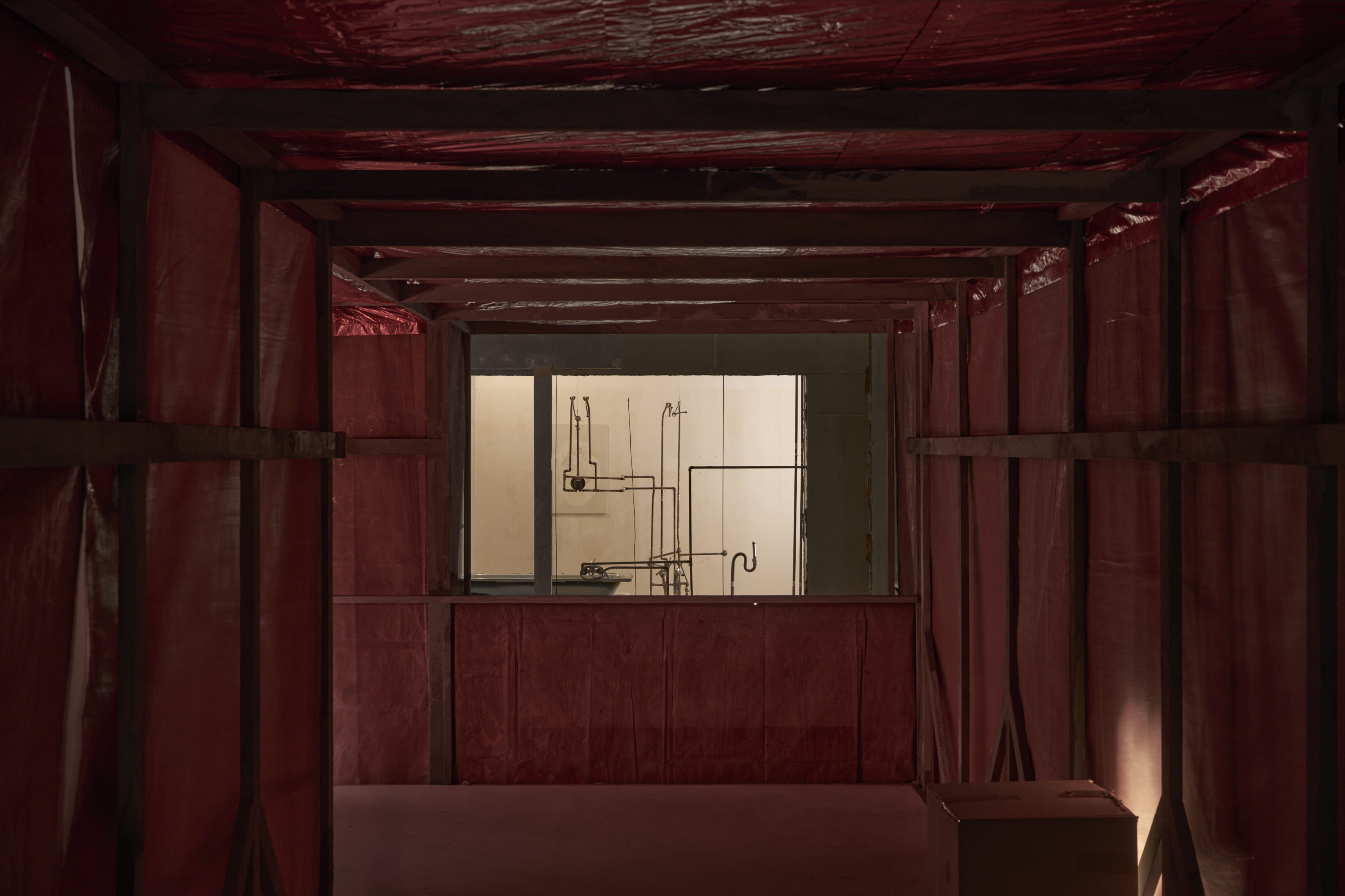 Tolia Astakhishvili, Singing out of doors, 2026, construction material, woven polypyrene, aluminum foil, found objects, light 1024.3 x 1055.6 x 237.3 cm my emptiness, 2025–26 construction material, excavated pipes, bathtub, shower tray, mirrors, light, 482.5 x 643 x 431 cm. Courtesy the artist, LC Queisser and Emalin. Photo: Tolia Astakhishvili Studio.