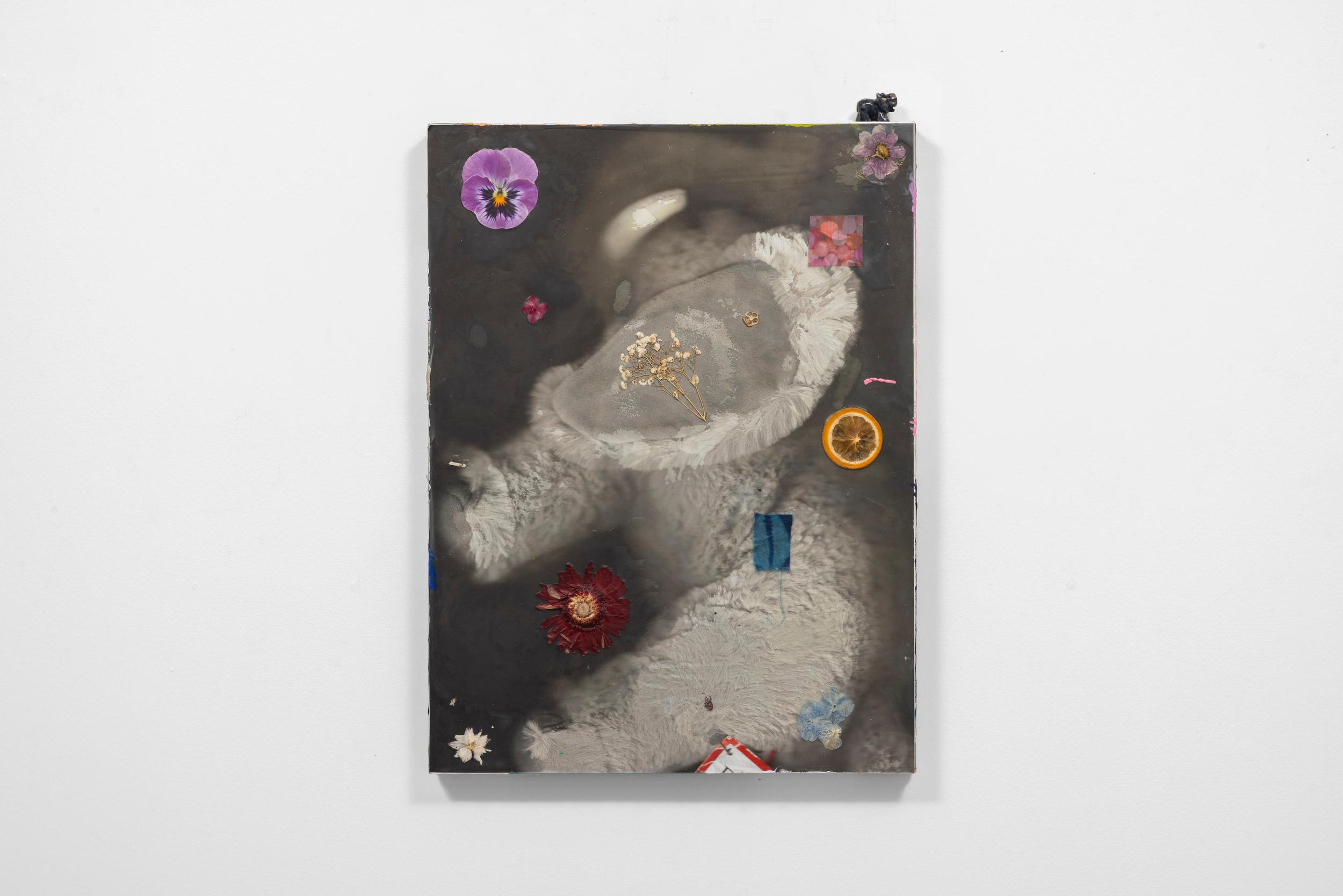 Faith Icecold, Elephant In the Room, 2026, Encaustic, pressed flowers, pressed fruit, paper cut-out on inkjet print on paper mounted on canvas; encaustic on inkjet prints on sticker paper, pigmented encaustic, carved, semi-precious stone figurine, 2412 × 1812 in (11.4 × 47 cm). Courtesy of the artist and Romance.