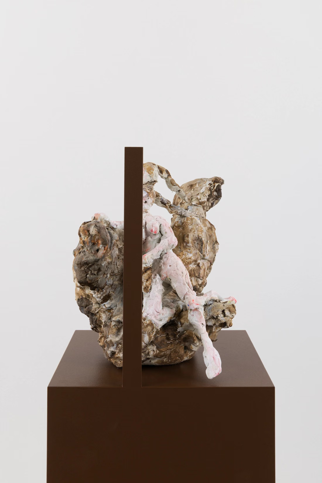 Rebecca Warren, Caryatid, with mirror hand-painted clay, on painted MDF plinth clay: 31 × 25 × 32 cm – 12 1/4 × 9 7/8 × 12 5/8 in plinth: 144 × 32 × 34 cm – 56 3/4 × 12 5/8 × 13 3/8 in, 2013/2026. Courtesy of the artist and Maureen Paley.