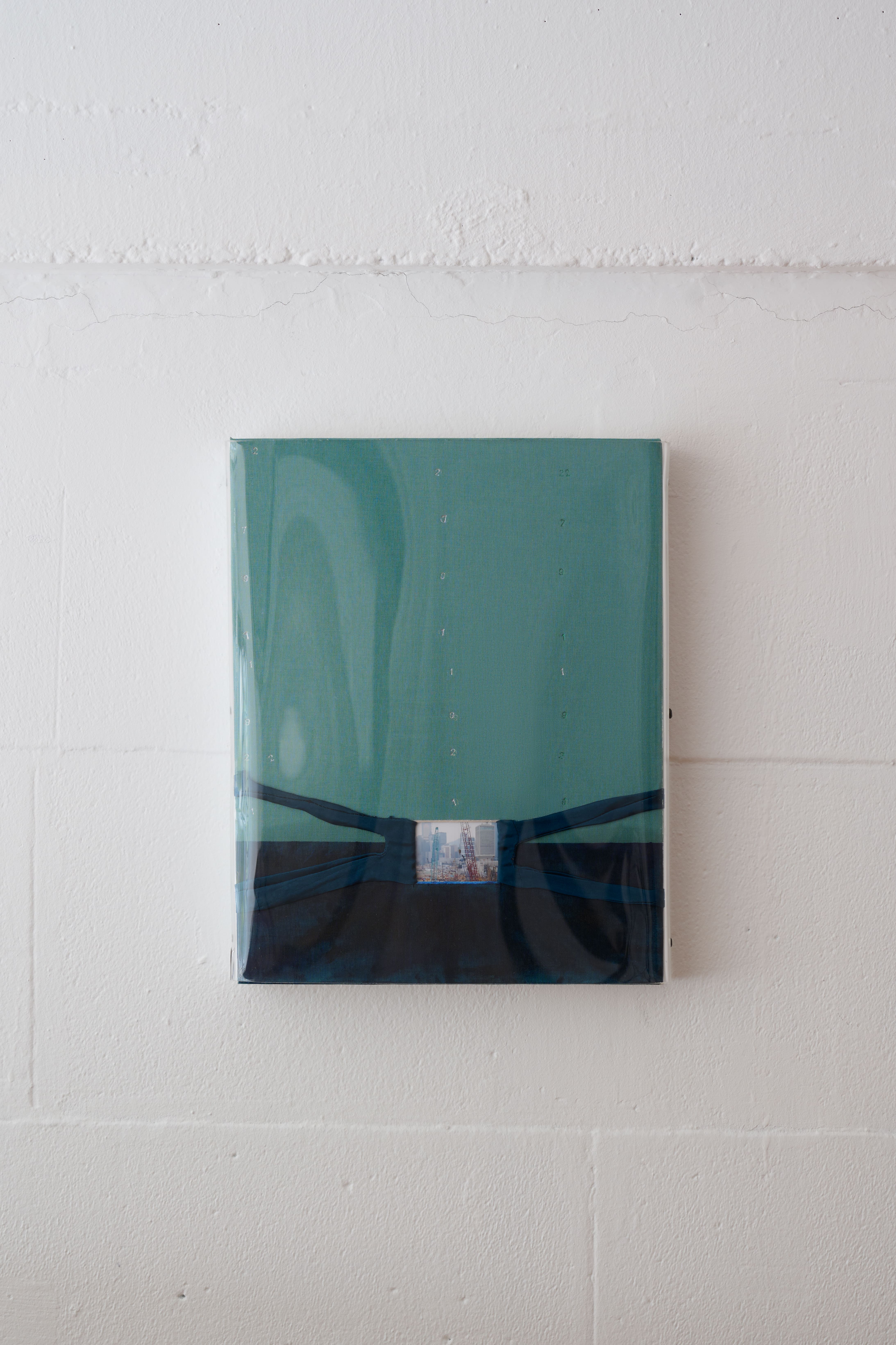 Marisa Kriangwiwat, 27911921, 2026, Acrylic, pine, used Robertson screws, salvaged silk/elastic blend cloth, polyester linen book cloth, embossing metallic, chromogenic glossy print on Kodak RC paper, 36 × 28 × 5 cm. Courtesy of the artist and Double.