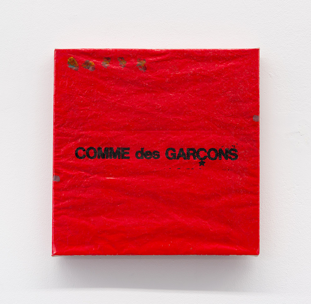 Tam Ochiai, Comme Des Garçons, 1992, acrylic on shopping bag, vinyl, 11 x 11 in. (27.9 x 27.9 cm). Courtesy of the artist and Ulrik.