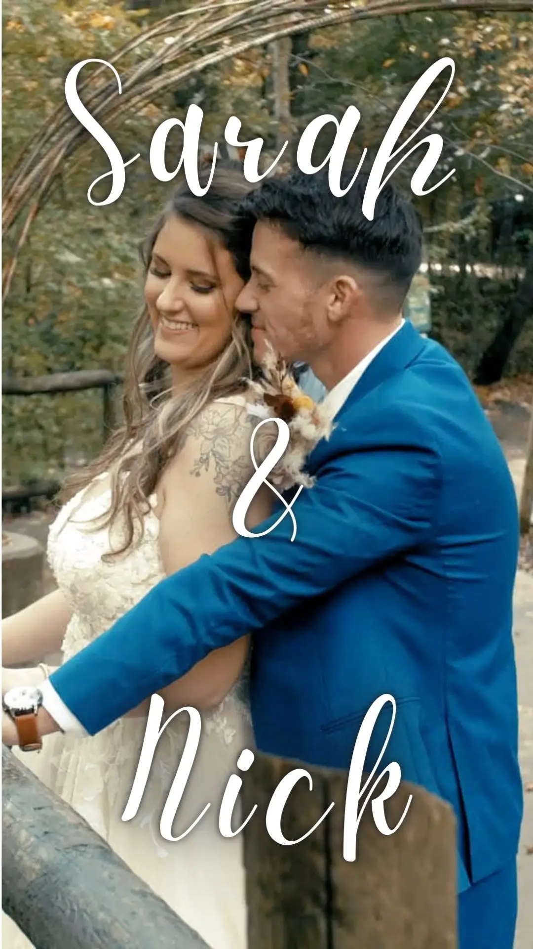 A bride and groom embrace outdoors in a wooded area, with decorative arches behind them. The text 'Sarah & Nick' overlays the image.