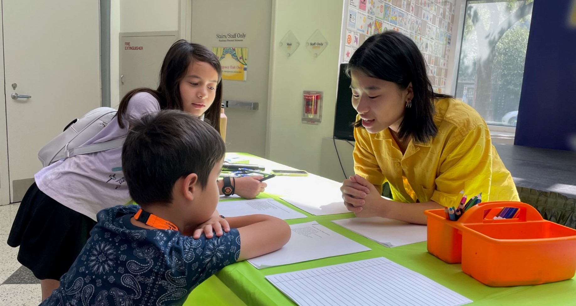 Houston Youth Poet Ariana Lee helps Museum visitors write poetry during the event.