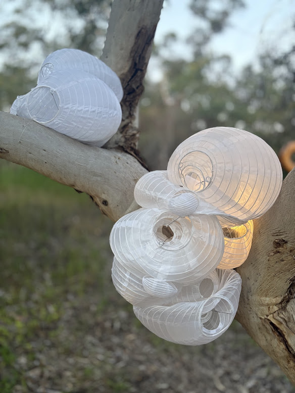 Stephanie De Biasi, Glow of the Wound, 2025, lanterns, nylon, wire, dimensions variable, Photo: Courtesy of Artist