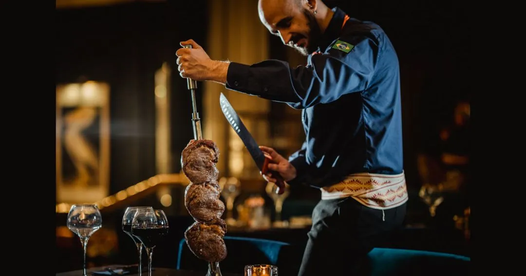 Rodizio steak cuts carved alongside wine at Rio Steakhouse Middlesbrough