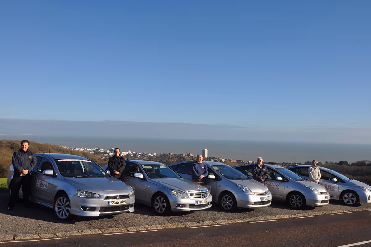 Group of Saloon Cars and Drivers