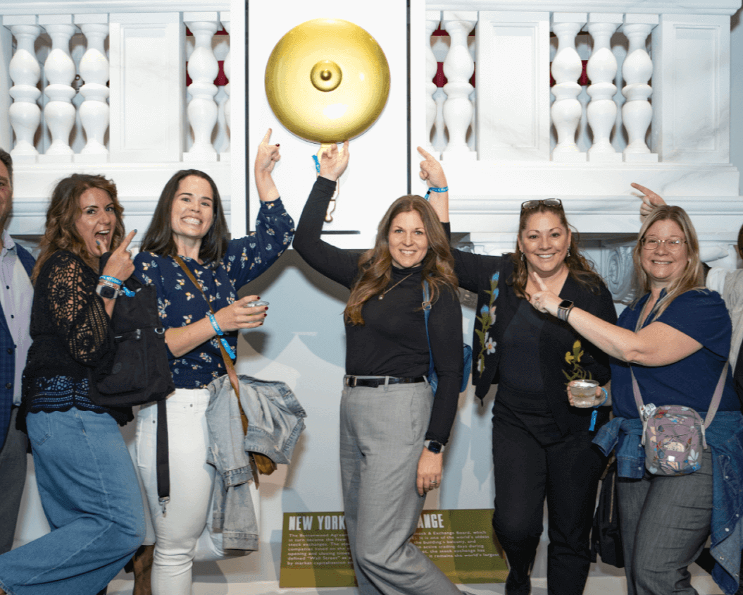 A group photo at RiseNY at a fun corporate event