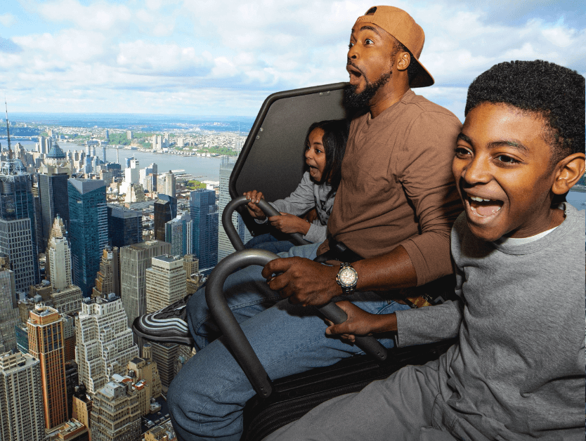 A family smiling and enjoying the ride of RiseNY