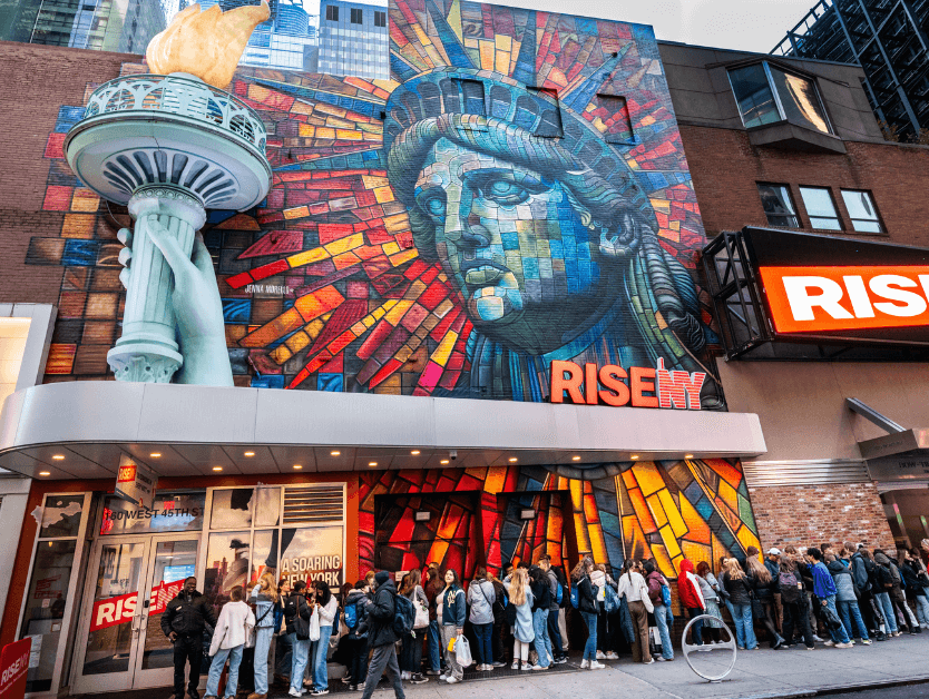 The outside of RiseNY showcasing their amazing statue of liberty mural