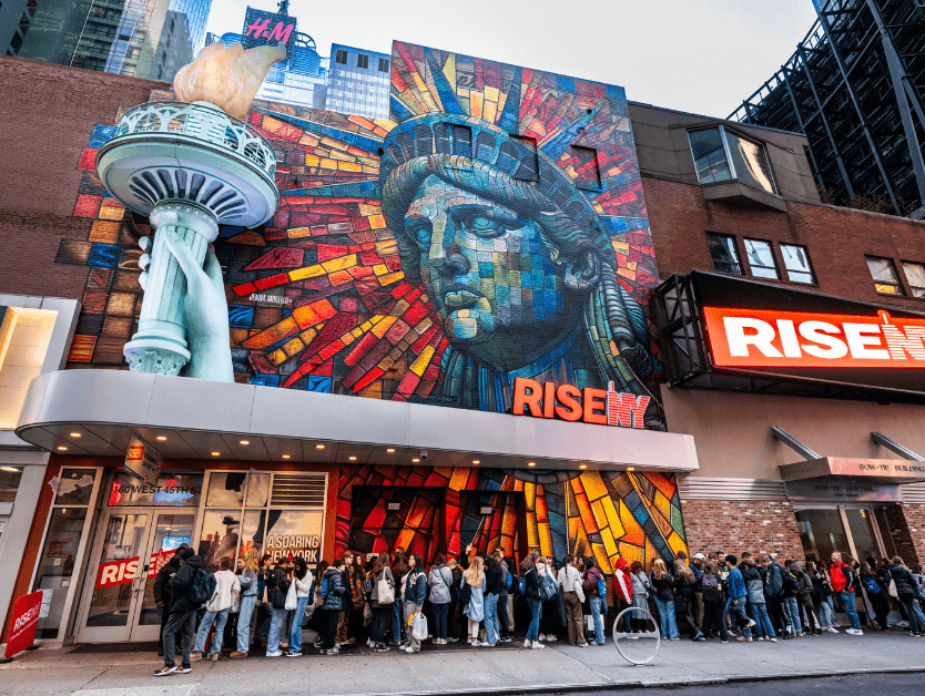 The outside of RiseNY showing off the beautiful mural of the Statue of Liberty
