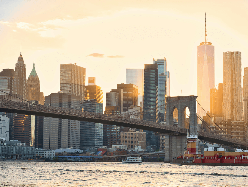 A shot of the New York City skyline as the sun rises