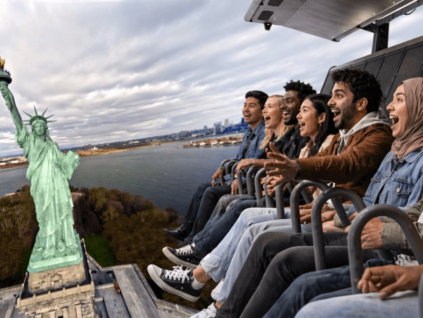 An image of people riding RiseNY's ride portion of the attraction
