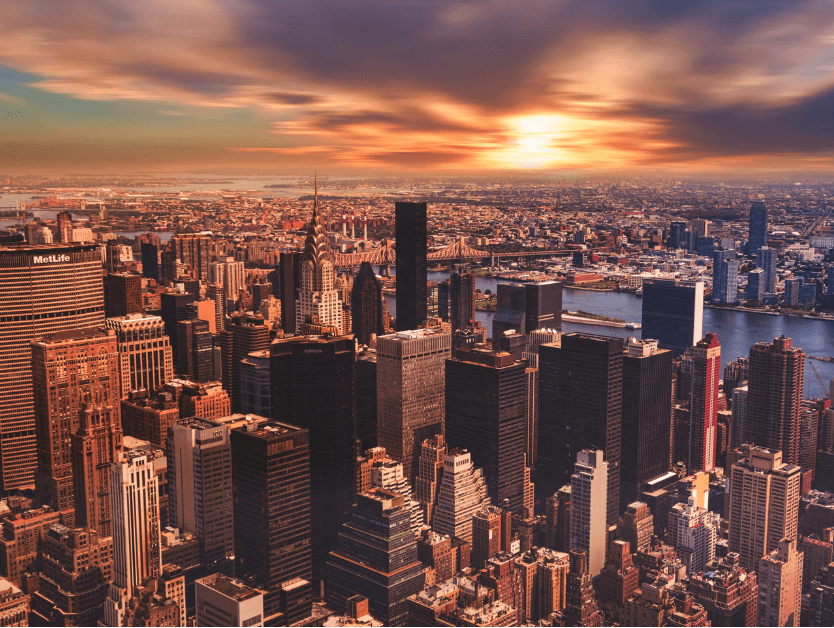 A sunset over the skyline of New York City
