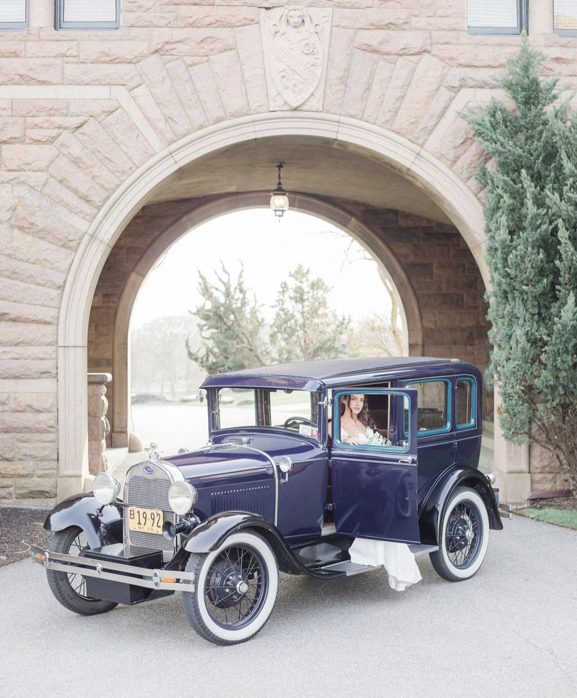 Front angle of 1929 Ford Model A Deluxe with Murray coachwork parked in Newport, RI – classic car rental by Newport Classic Car Co. for weddings, events, and vintage photo shoots.