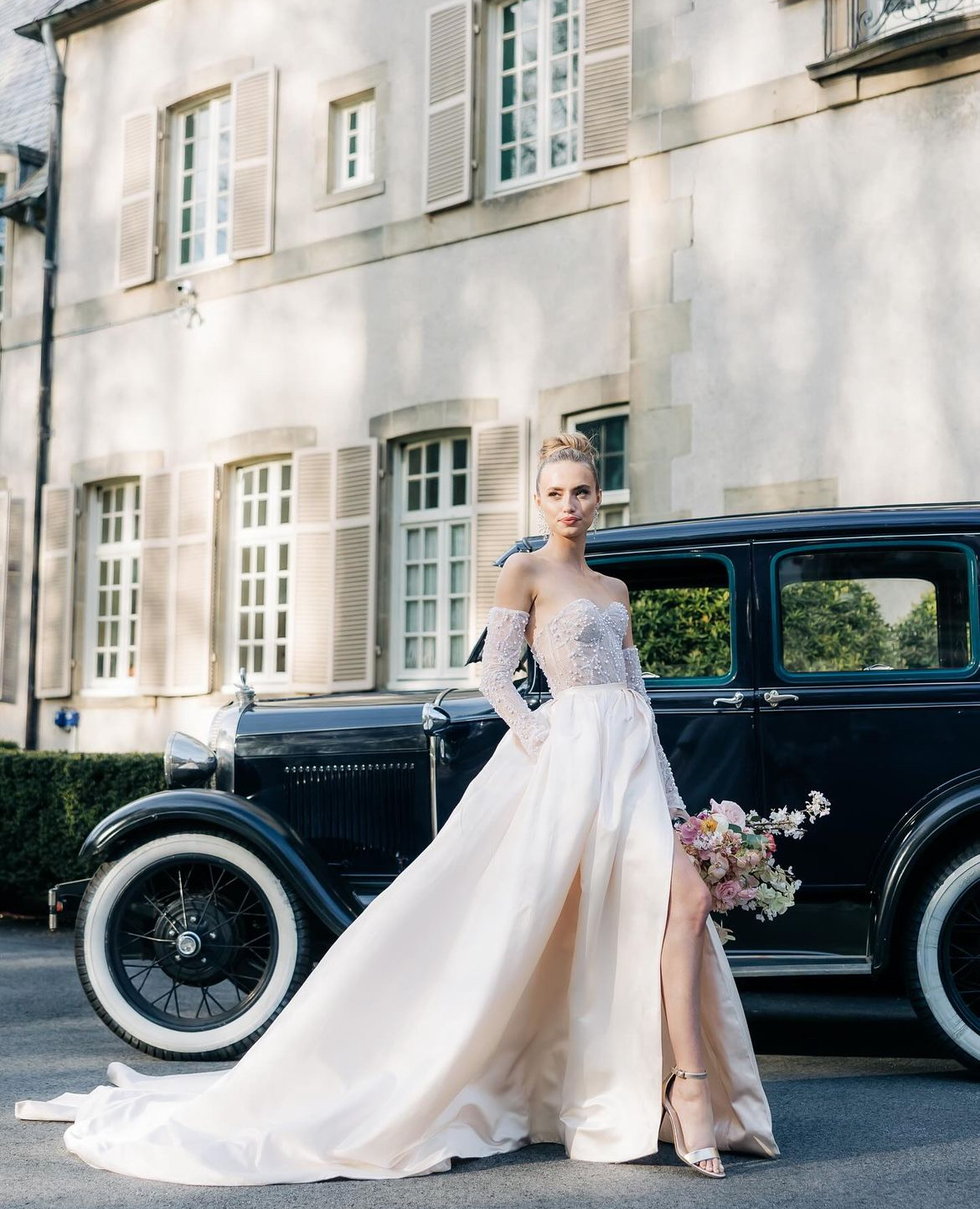 1929 Ford Model A Deluxe with Murray coachwork parked on Newport RI coastline – vintage car rental by Newport Classic Car Co. for weddings, photo shoots, private tours, and events.