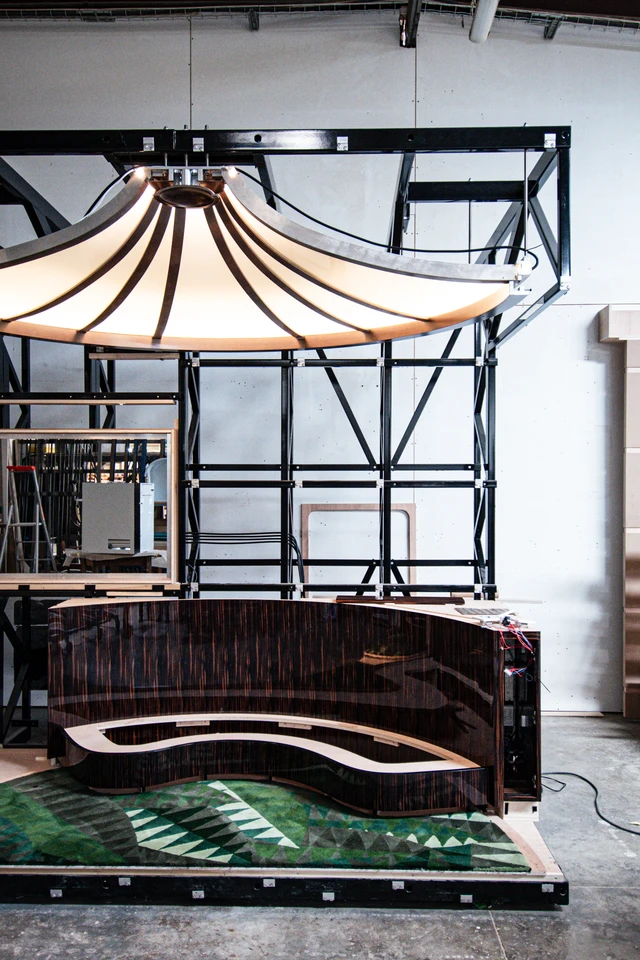 A part of L'Orient Express bar car's vaulted ceiling under construction in a workshop.