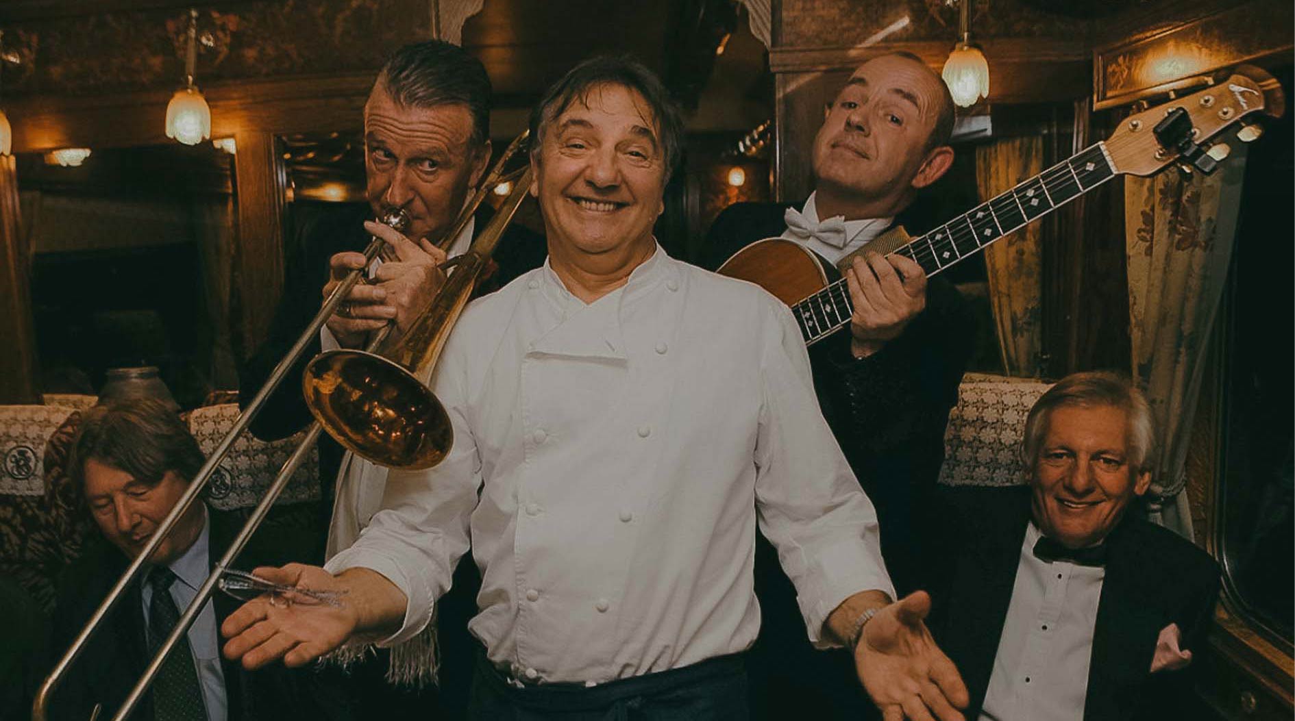 Musicians onboard the Northern Belle playing their instruments.