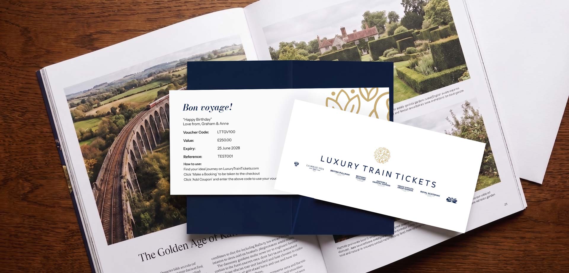 A LuxuryTrainTicket.com gift voucher on top of an editorial travel magazine.
