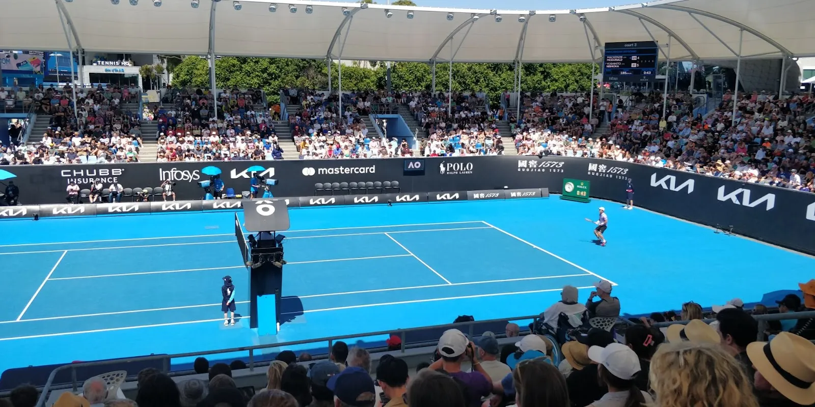 Australian Open tennis match between McDonald and Nishioka