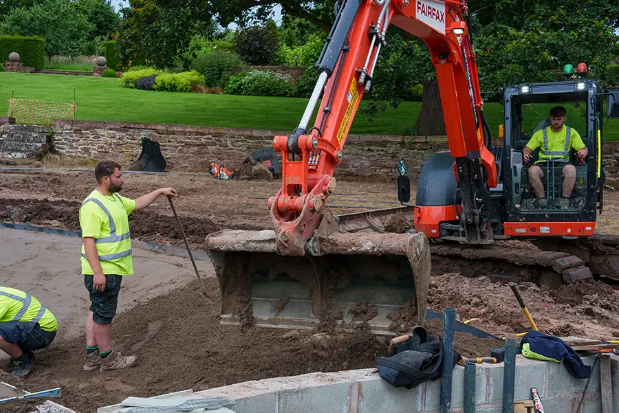 Natural pool construction - digger