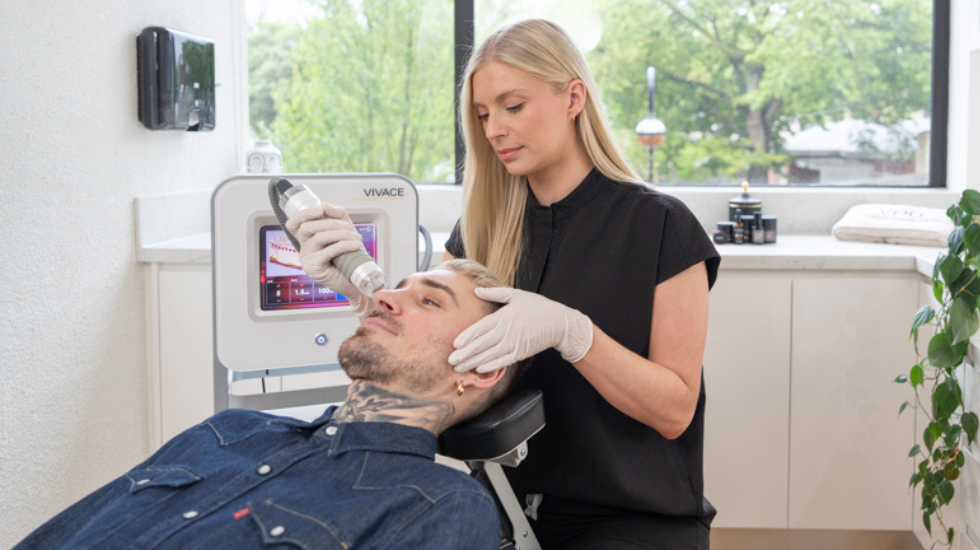 A Victorian Dermal Group specialist uses a non-surgical skin treatment device to reduce under-eye bags.