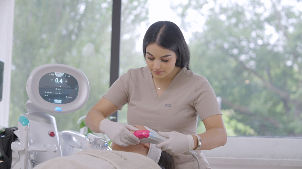 A dermal clinician performs a non-surgical neck tightening treatment using Ultraformer MPT at Victorian Dermal Group.