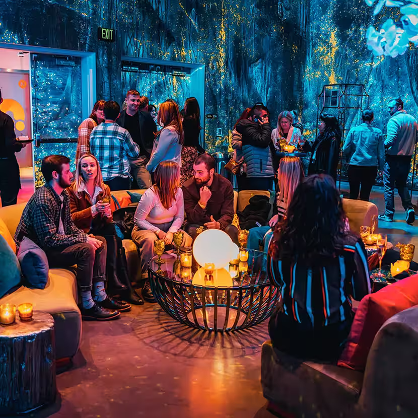 People at a corporate event at Meow Wolf Houston