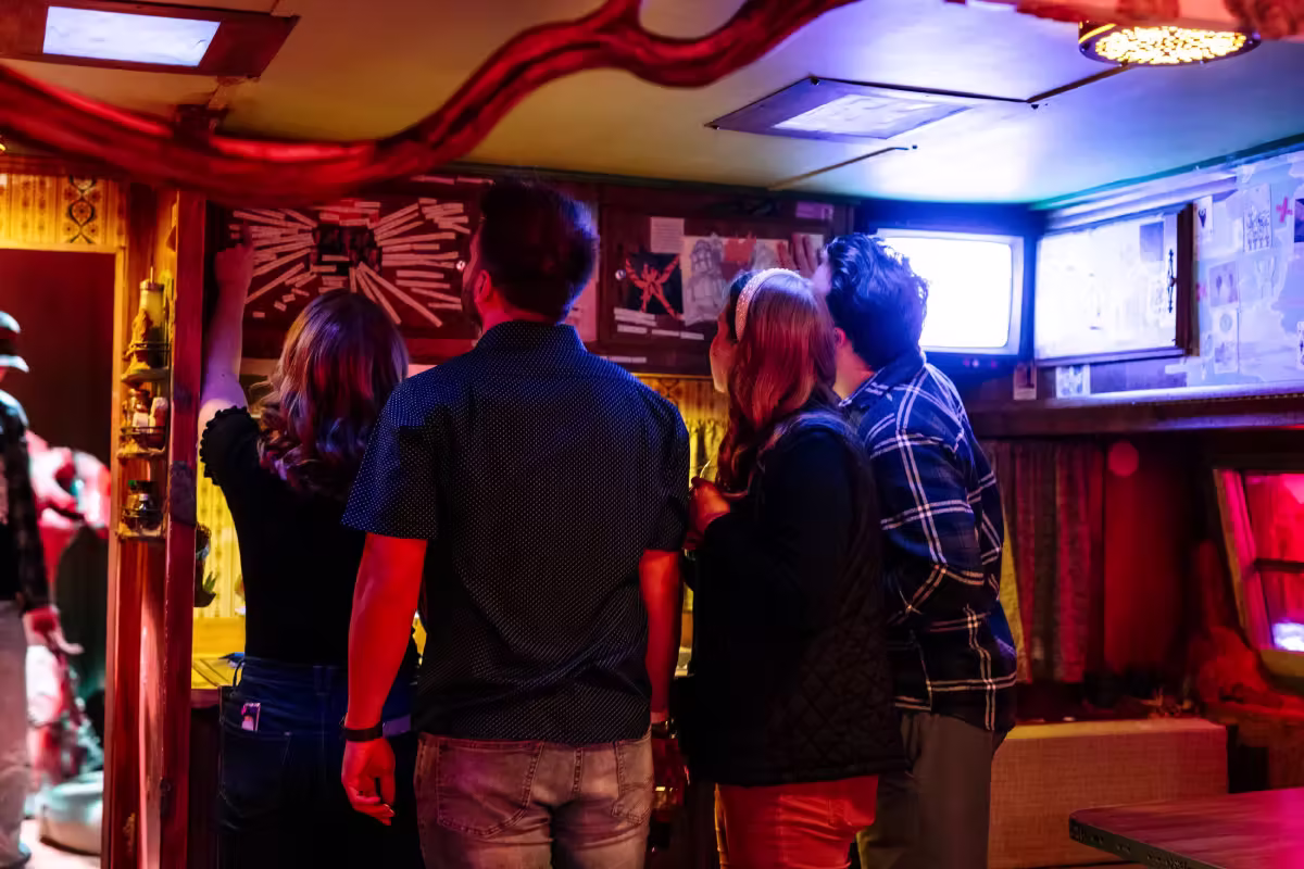 A group of visitors at Meow Wolf Grapevine adultiverse. 