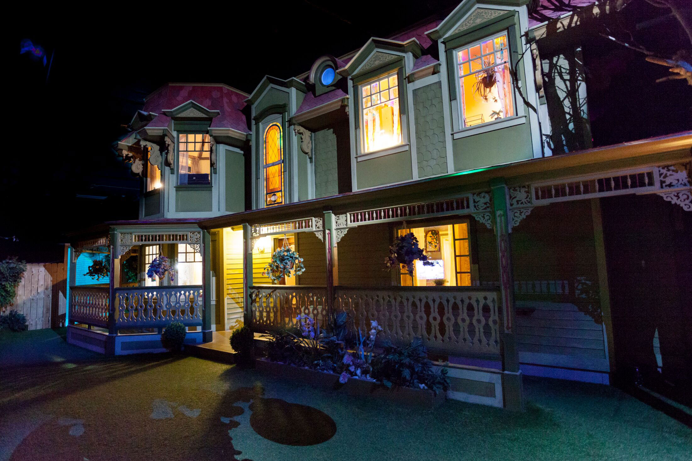 a seemingly normal house with lights coming from within