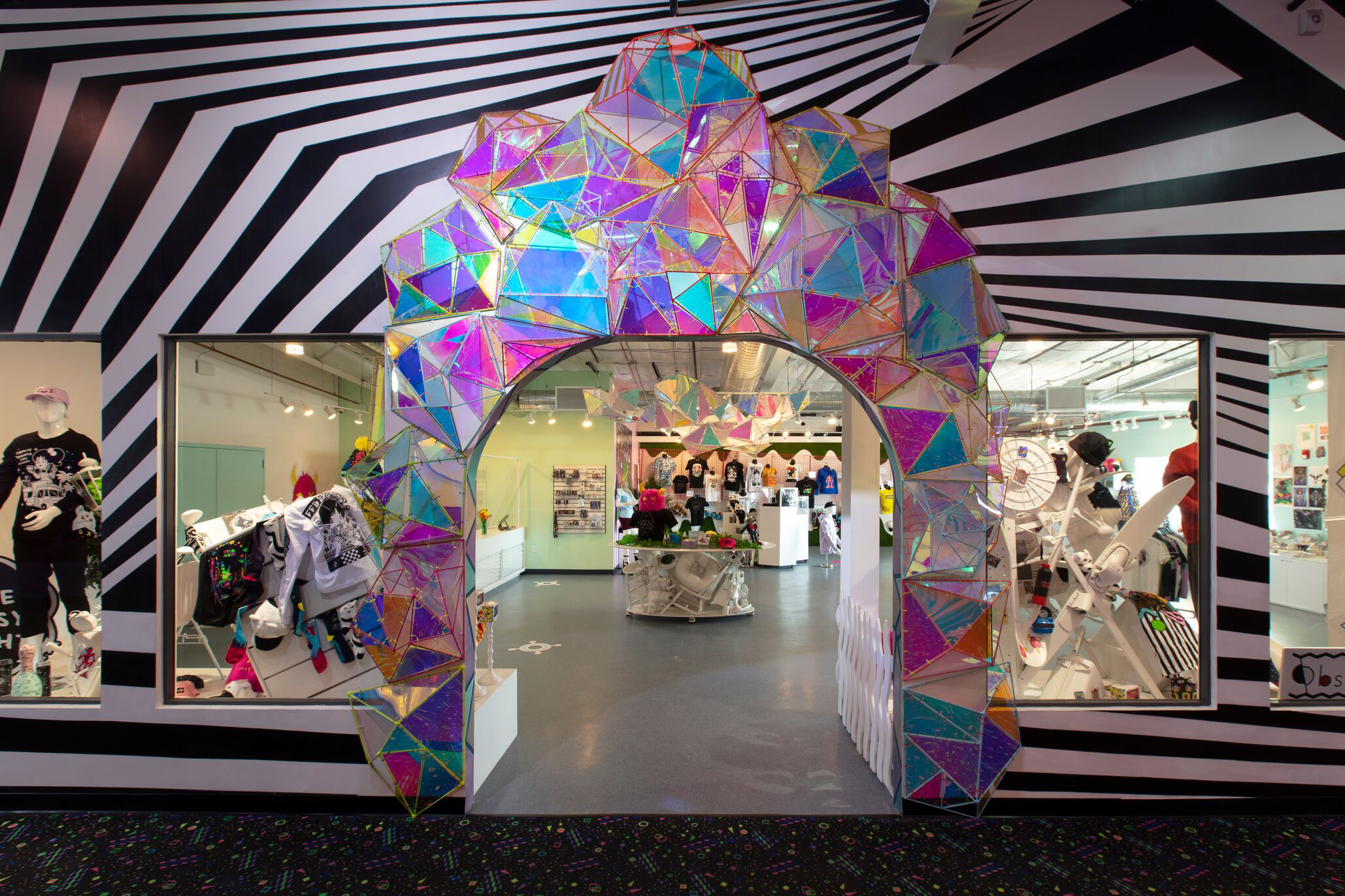 Meow Wolf gift shop space in Santa Fe with lots of black and white lines