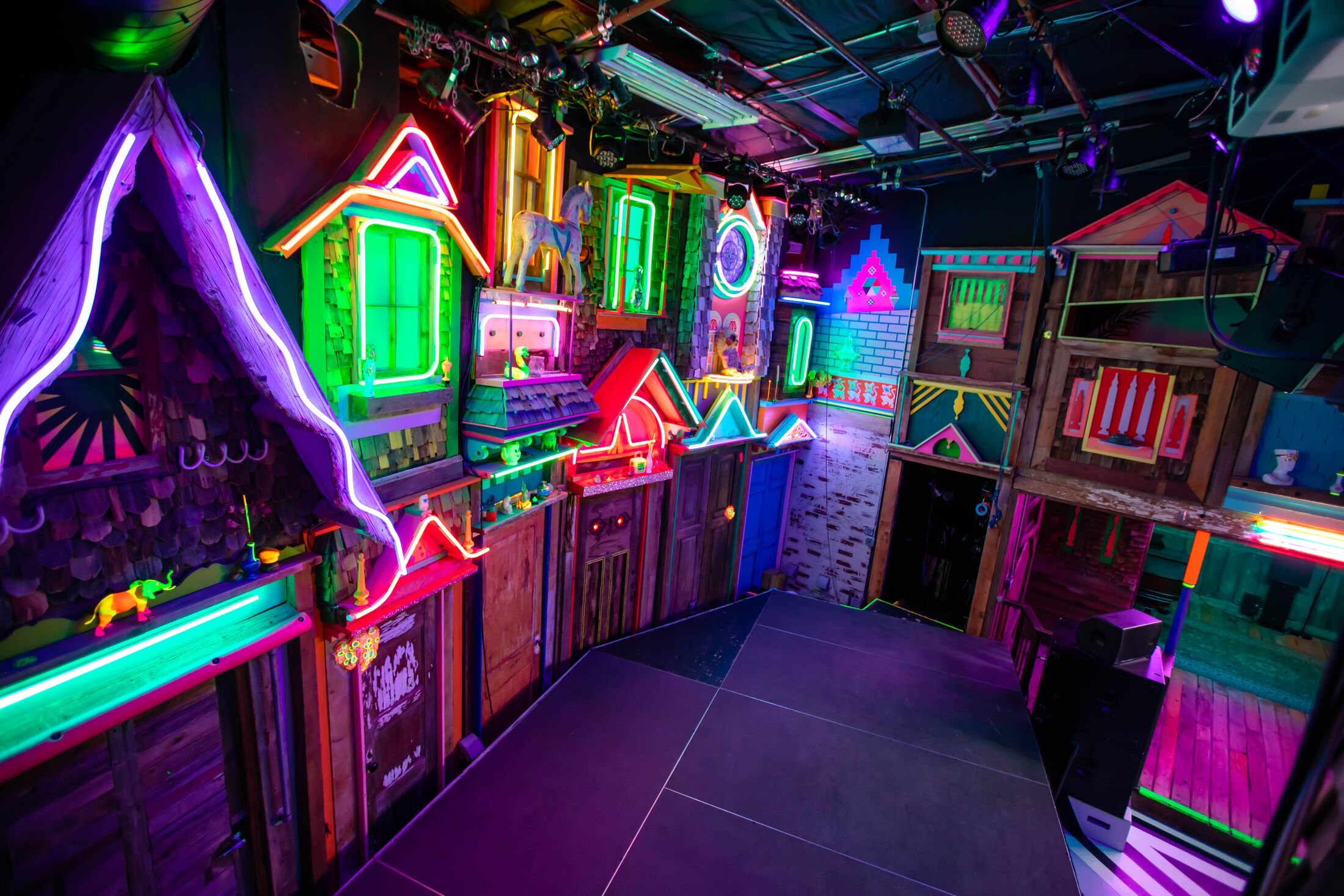 neon houses inside an event space