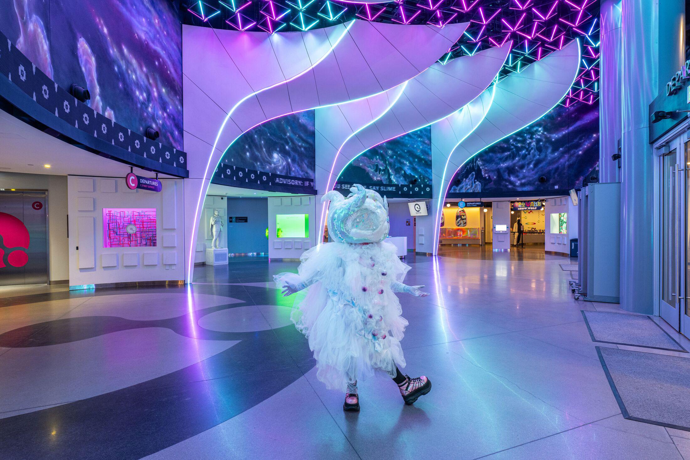 brightly lit lobby at Meow Wolf