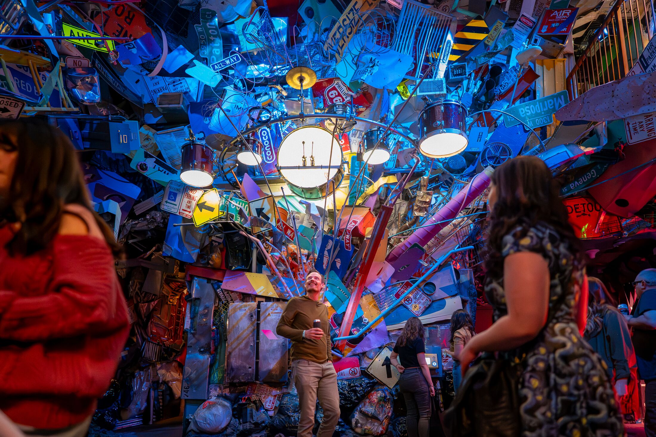 people hanging out at a 21+ night at Meow Wolf