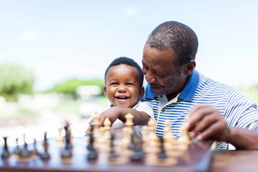 Grandfather playing chess.