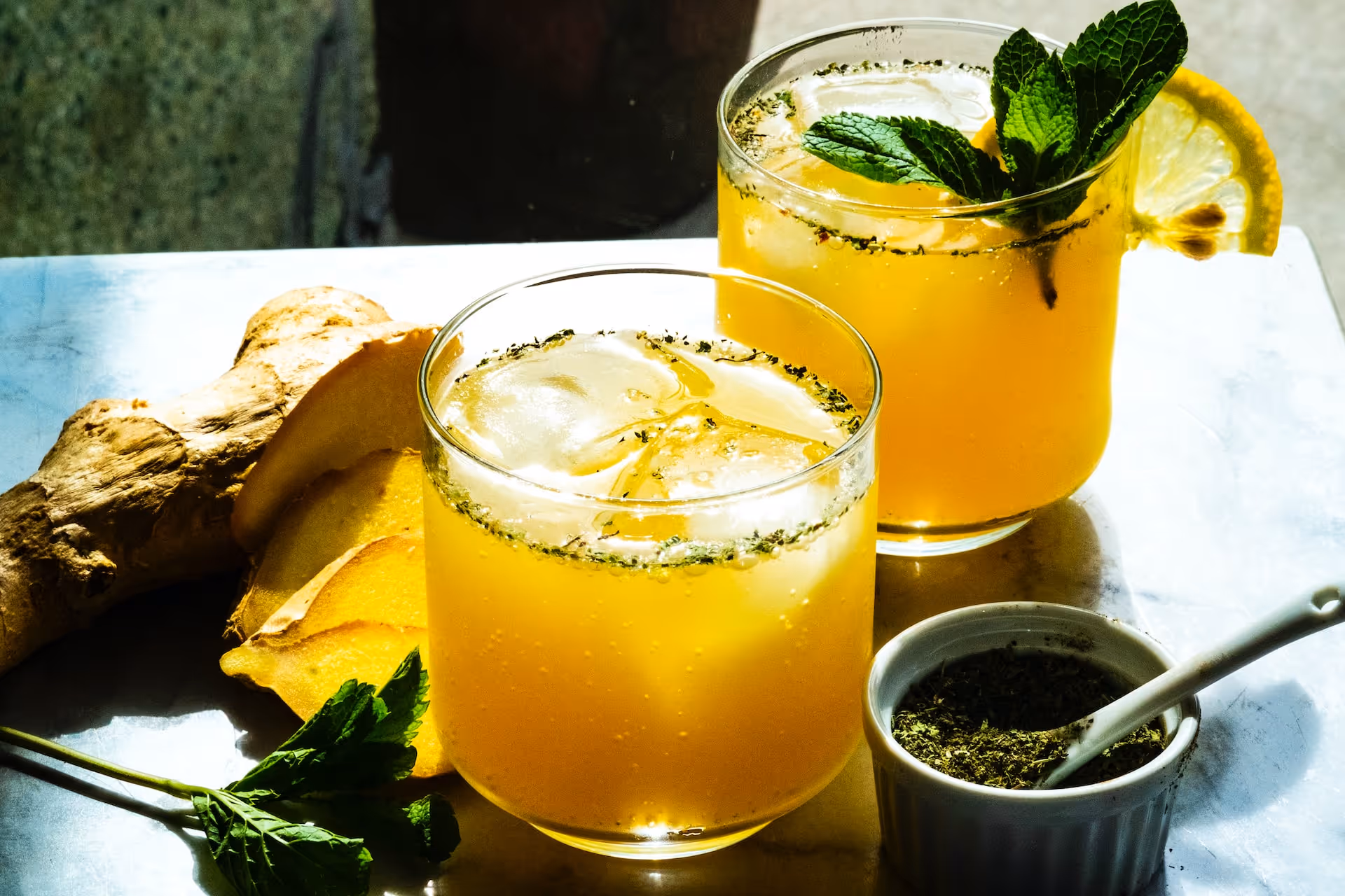 herbal tonic cocktail containing ginger and mint