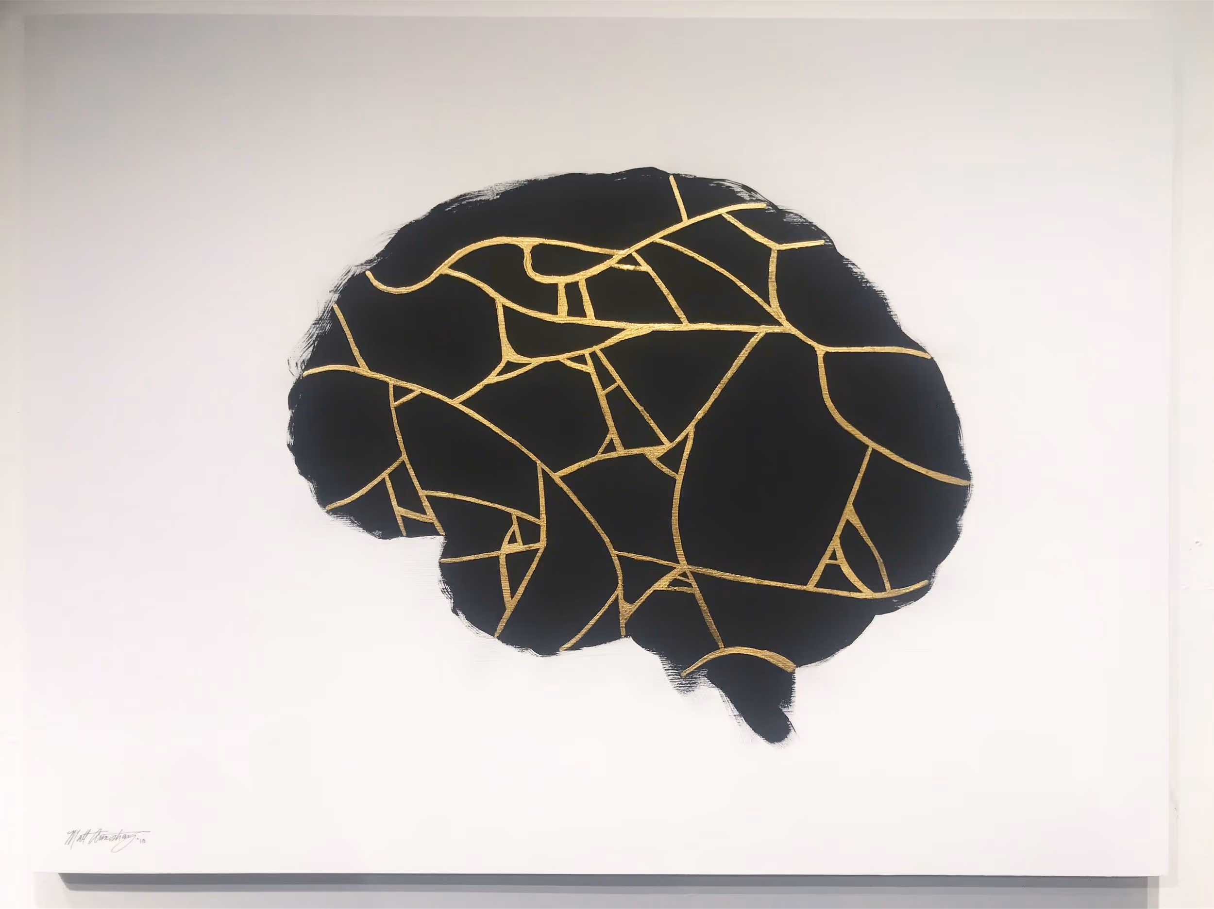 print of a brain mended by gold kintsugi lines