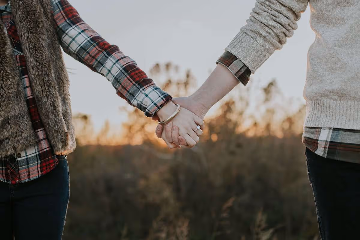 Couple holding hands
