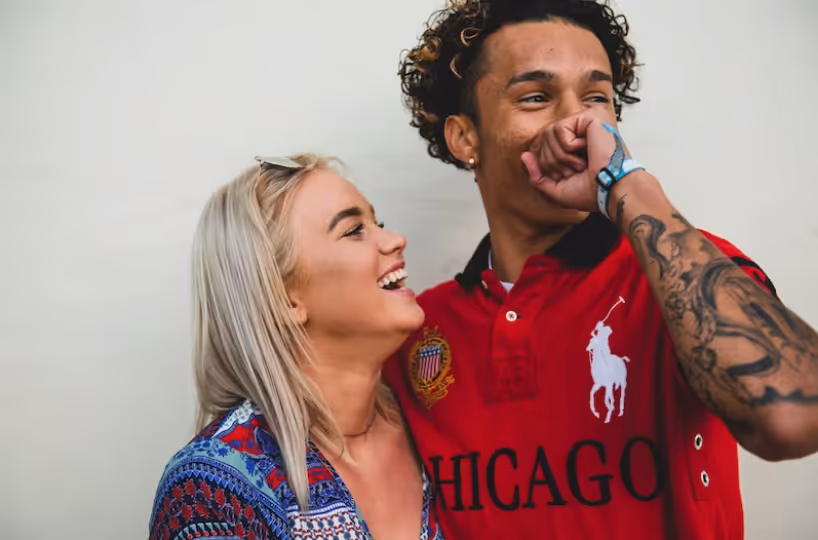 A couple laughs together
