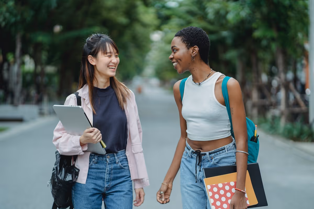 Two friends spending down time together after hours of studying.Â
