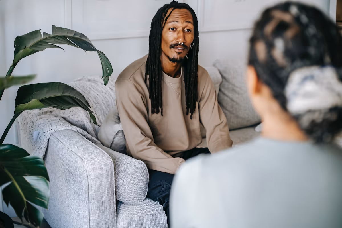 A man having a conversation with a therapist.