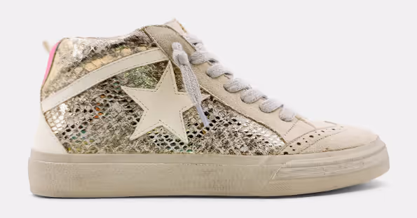 Pauline shiny sneaker has snakeskin-like base with off white accents and star.