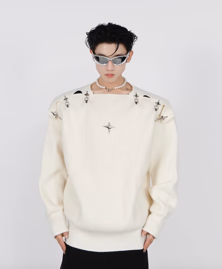 white sweater with silver details
