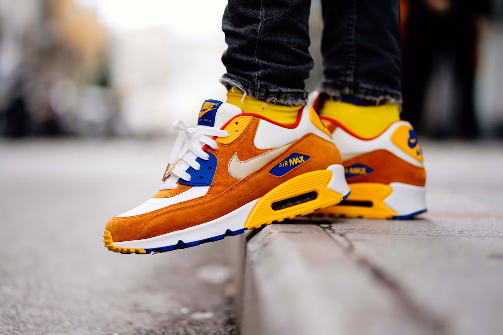man wearing colorful Nike sneakers