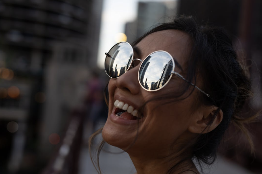 woman in an affordable dupe for premium sunglasses